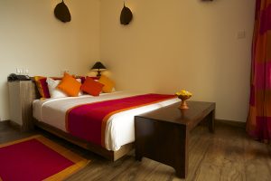Thaulle pure ayurveda resort bed room
