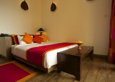 Thaulle pure ayurveda resort bed room