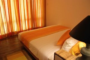 Thaulle pure ayurveda resort bed room