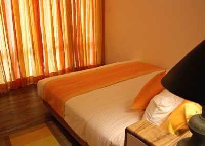 Thaulle pure ayurveda resort bed room